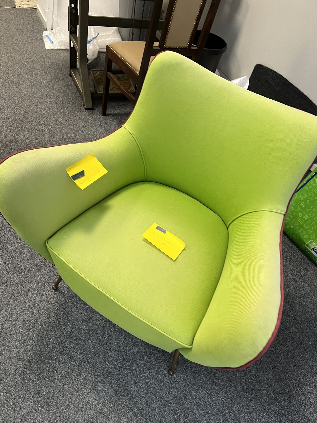 Armchair re-covered in acid-green fabric