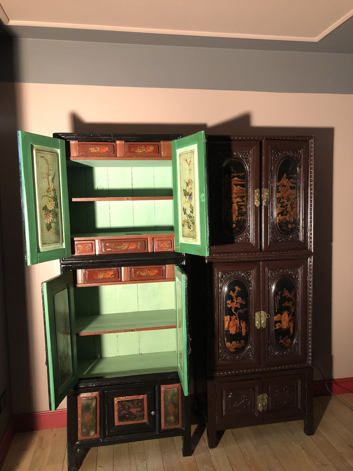 Painted green Chinese cabinet with open doors