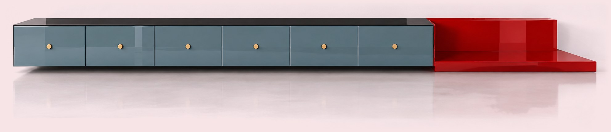 Very long blue-grey low cabinet with brass knobs ending in a red lacquered shelf