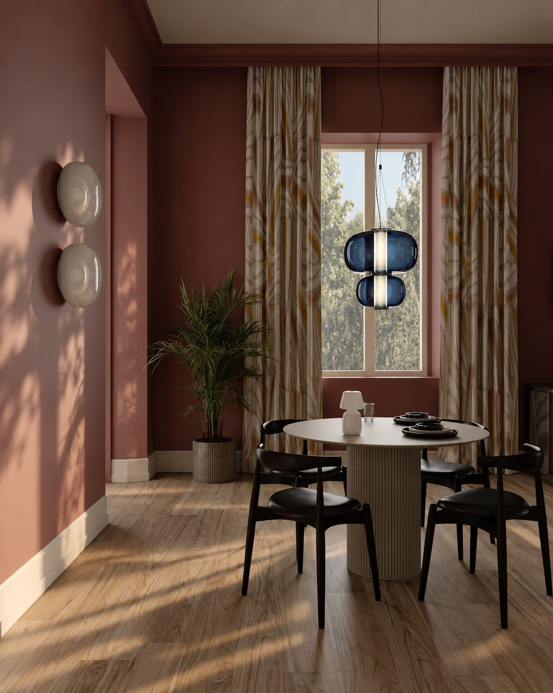 Terracotta dining room by a tall curtained window