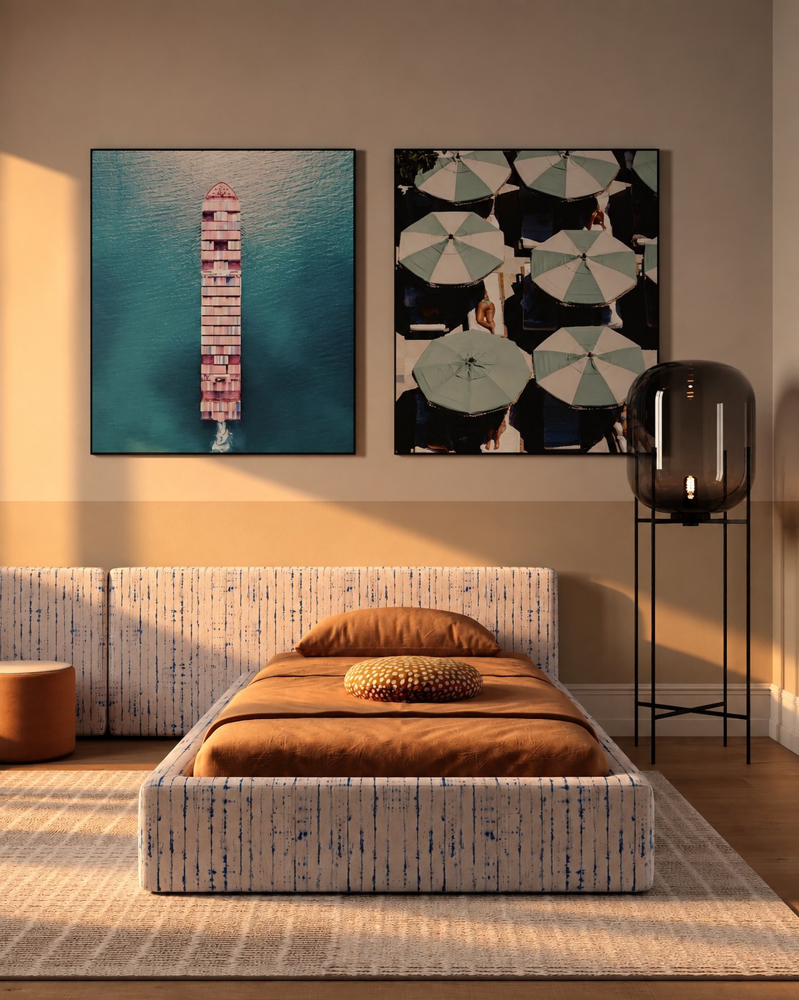 Single bed beneath two photographs