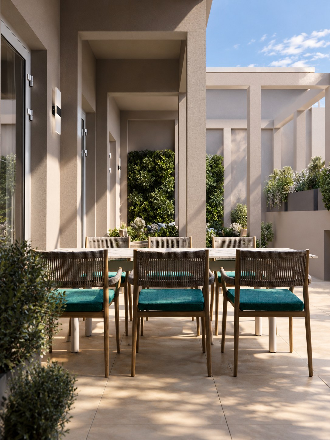 Dining table on the roof terrace under a pergola