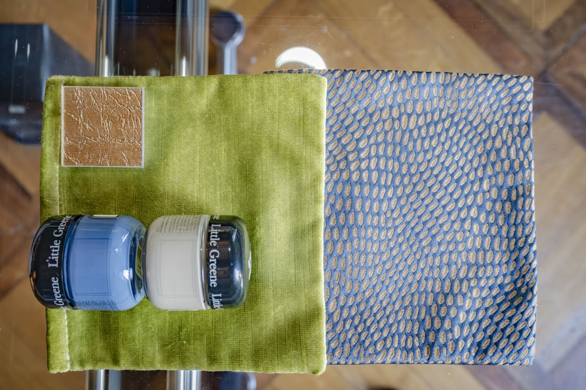 Green velvet, paint jars and a textured grey fabric