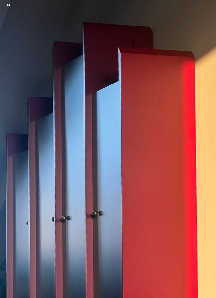 Red and grey lacquered doors in a row