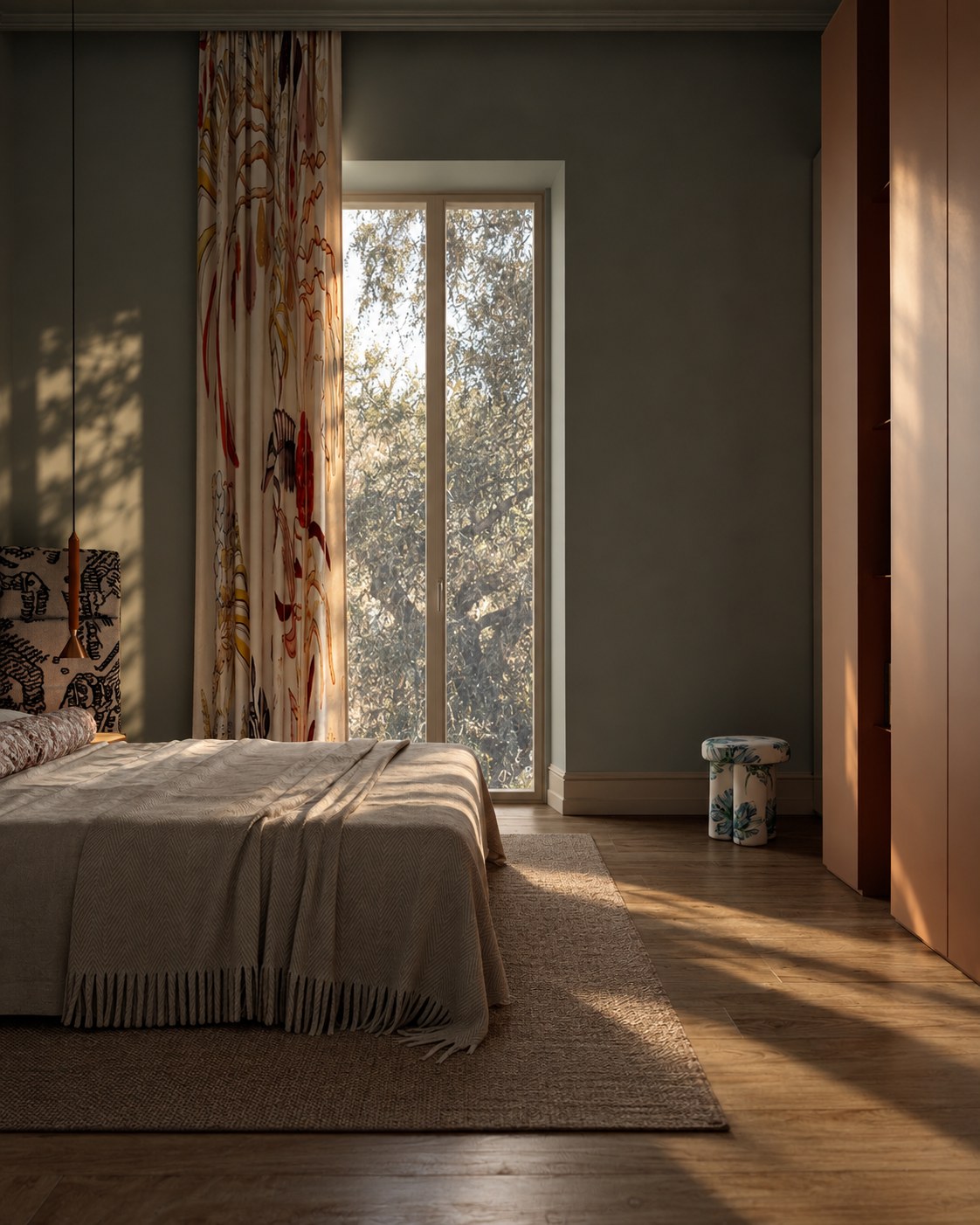 Bedroom with a floral curtain and a window onto olive trees